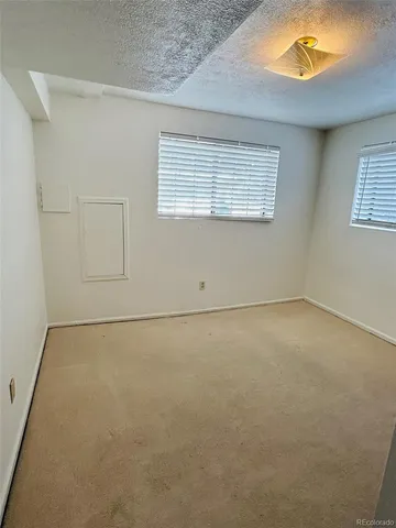 a kitchen with stainless steel appliances a sink stove and refrigerator