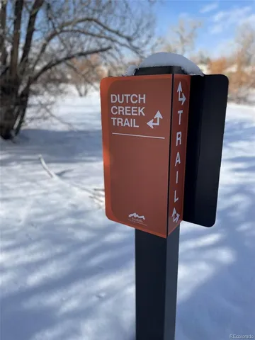 a bedroom with a bed and curtain