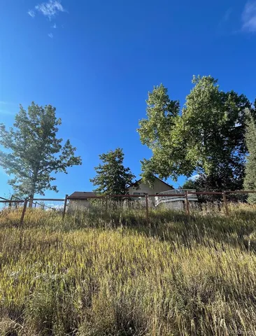 a view of a refrigerator in a room