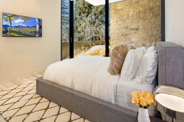 a view of living room with furniture and wooden floor