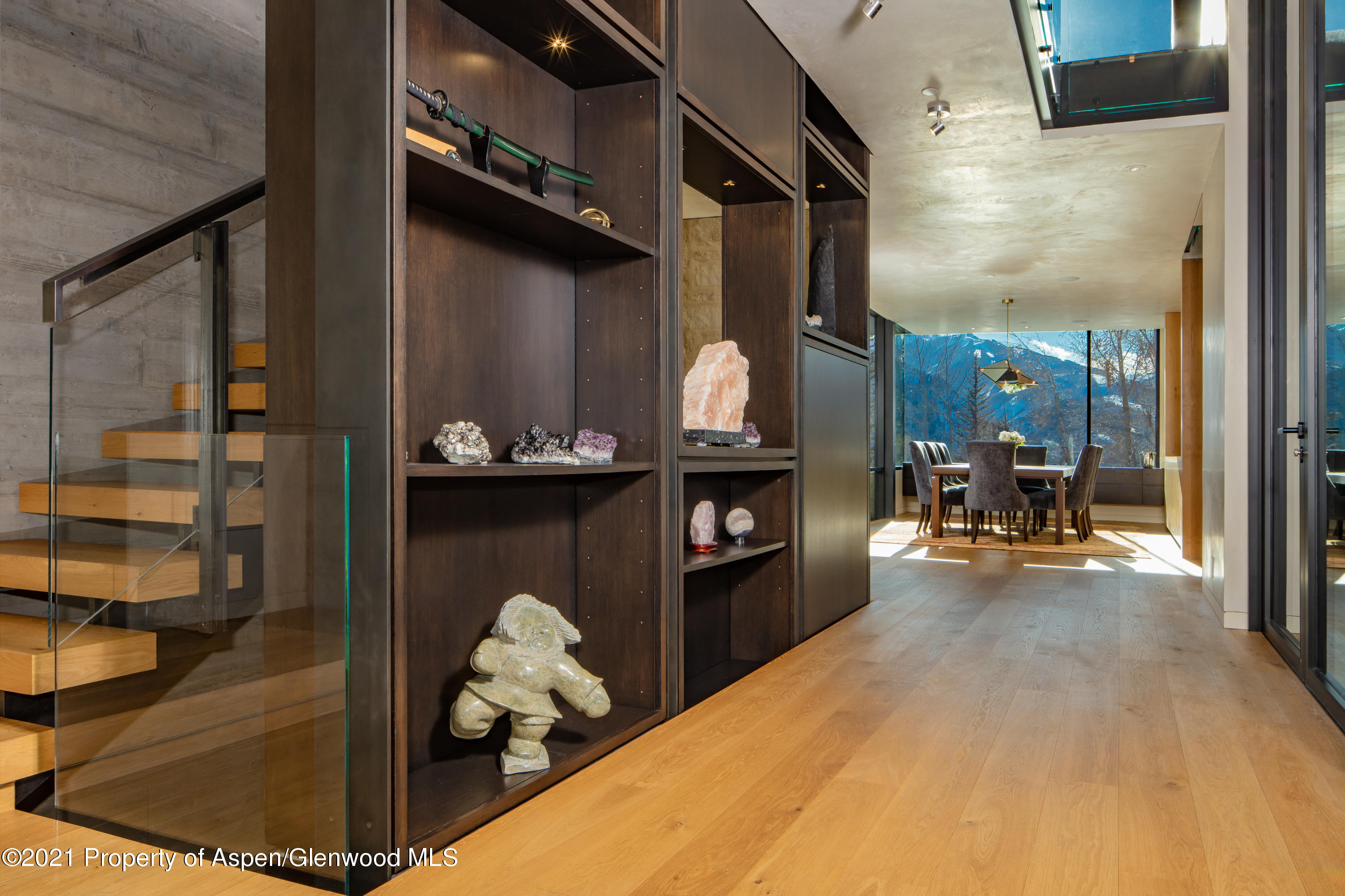 979 Red Mountain Road Aspen, CO 81612 - Photo 16 of 20 a view of living room with furniture and wooden floor