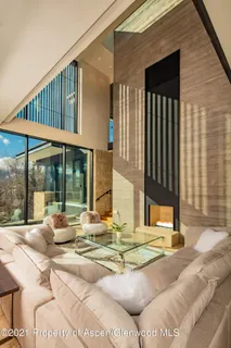 a view of a house with backyard and porch