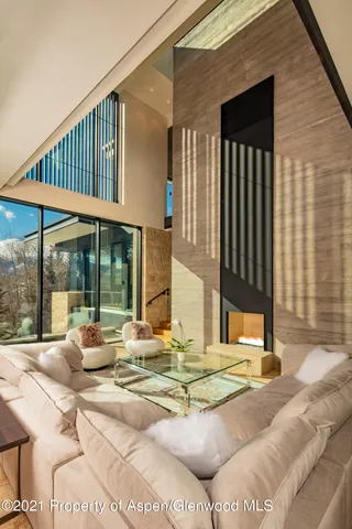 a view of a house with backyard and porch