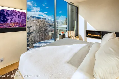 a bed room with a bed and a couch