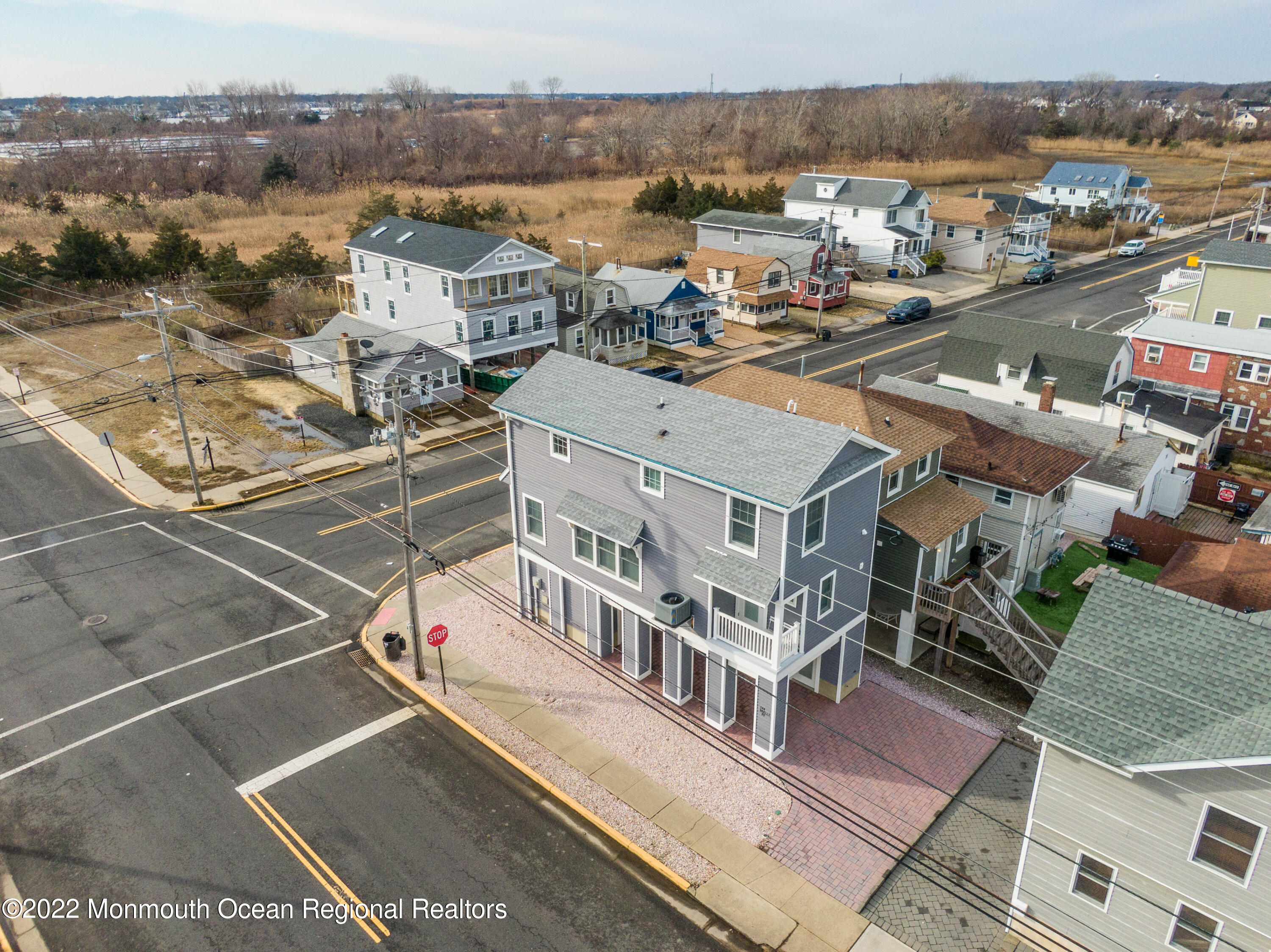 544 Brielle Road Manasquan, NJ 08736 - Photo 1 of 20 a view of a city with tall buildings