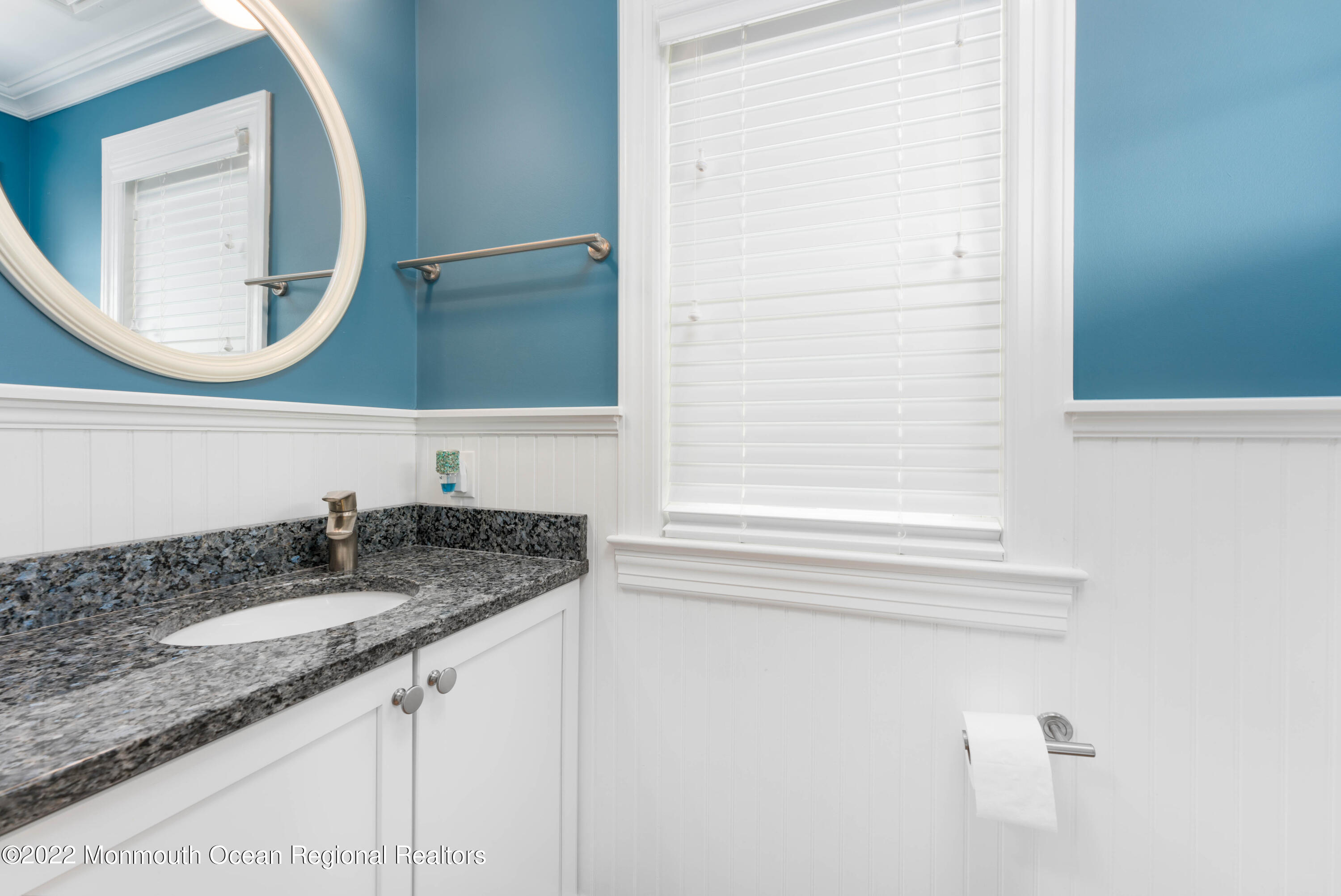 544 Brielle Road Manasquan, NJ 08736 - Photo 13 of 20 a bathroom with a granite countertop sink and a mirror