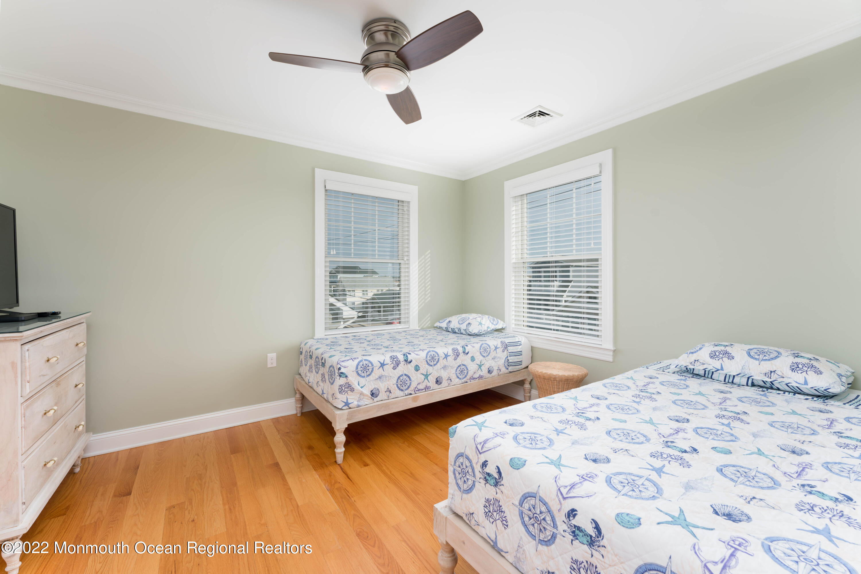 544 Brielle Road Manasquan, NJ 08736 - Photo 17 of 20 a bedroom with two beds and a dresser