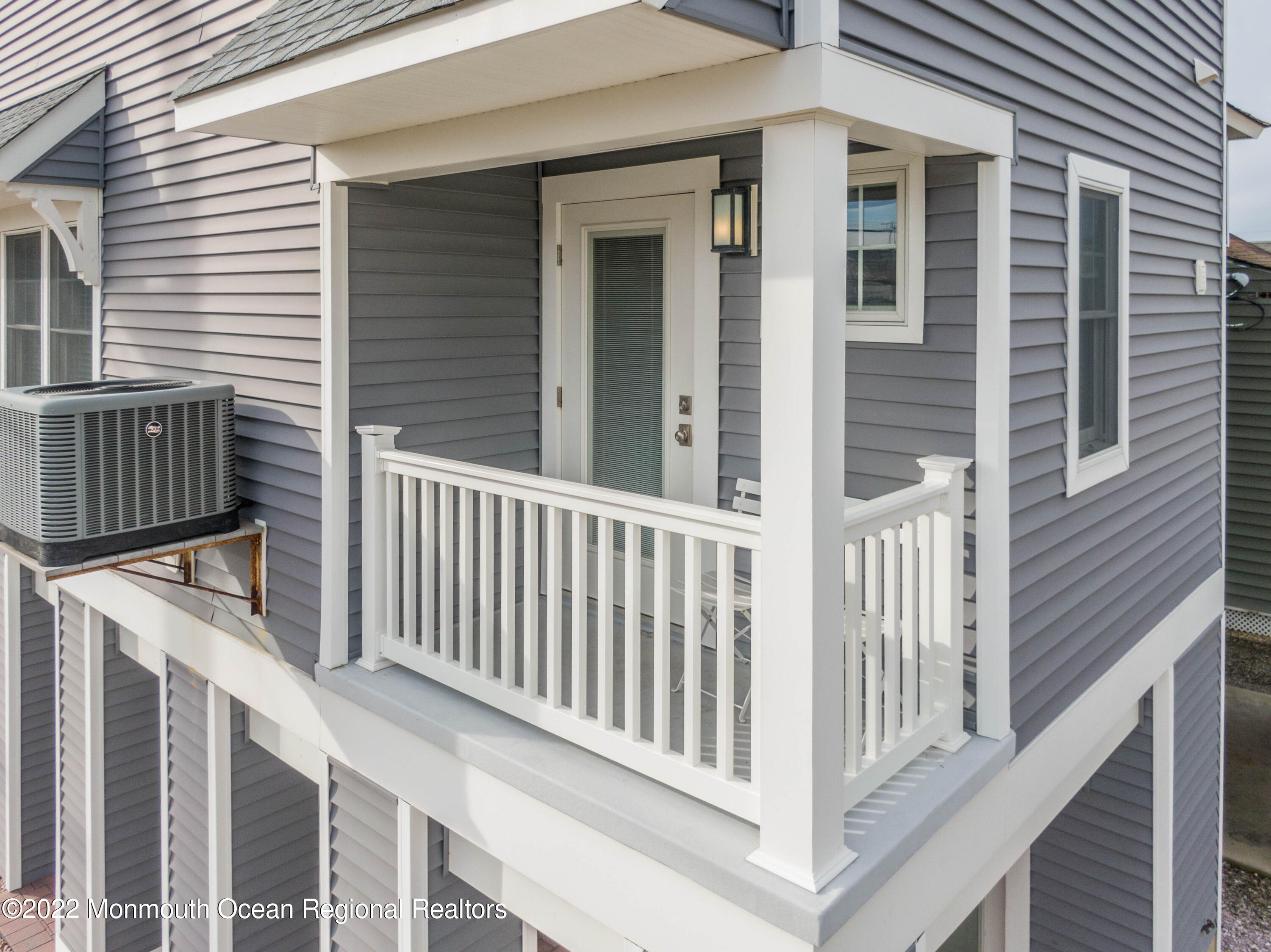 544 Brielle Road Manasquan, NJ 08736 - Photo 6 of 20 a view of a house with wooden fence