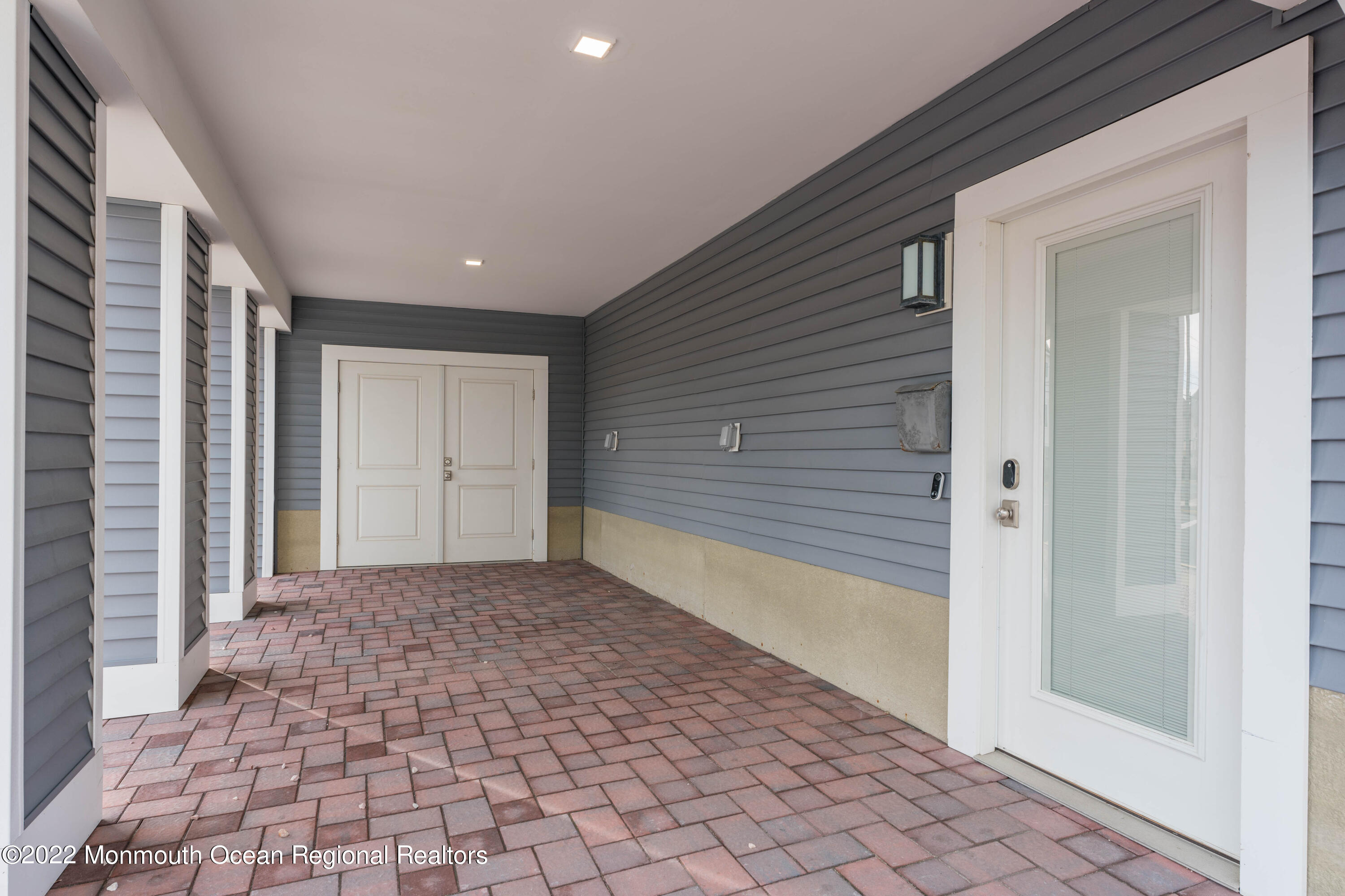544 Brielle Road Manasquan, NJ 08736 - Photo 7 of 20 a view of a house with a porch