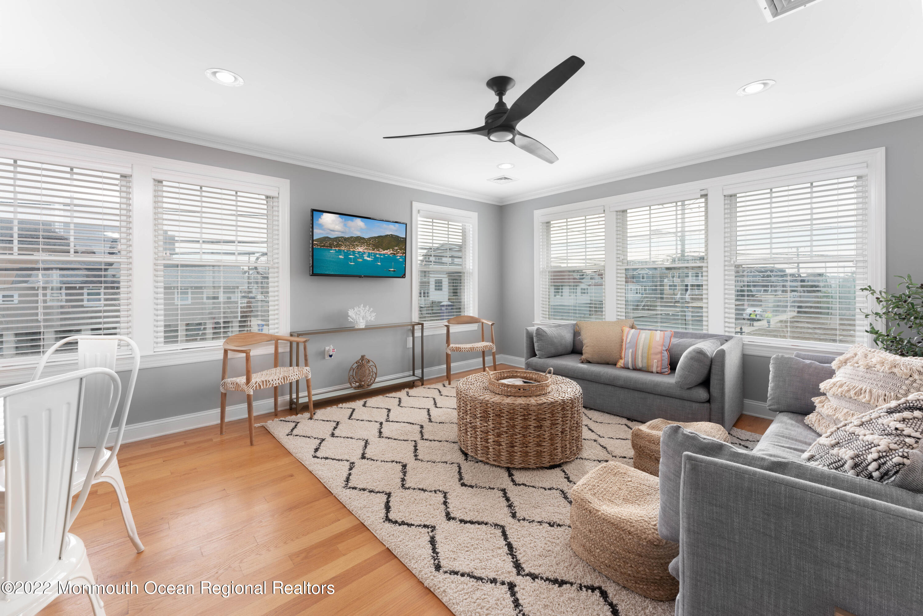 544 Brielle Road Manasquan, NJ 08736 - Photo 8 of 20 a living room with furniture and a flat screen tv