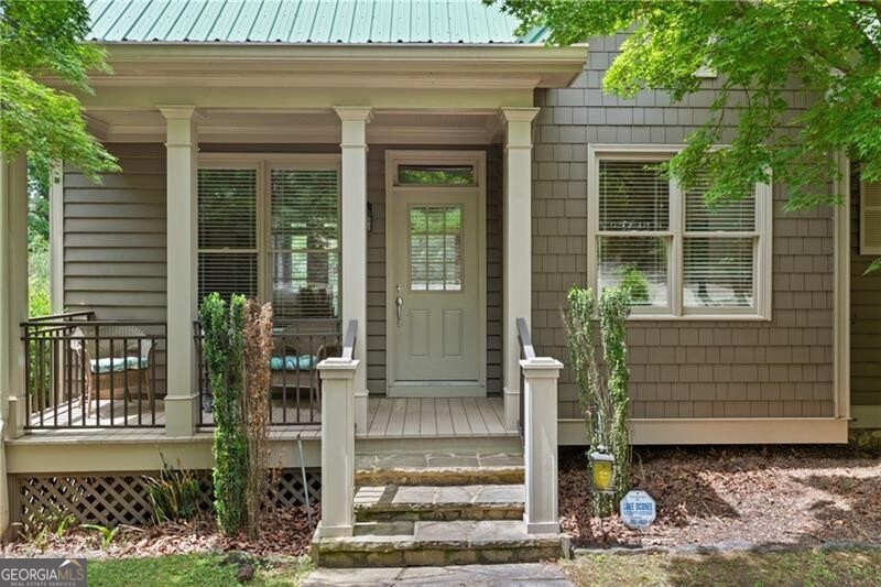 1041 Fox Chase Run Greensboro, GA 30642 - Photo 17 of 45 a front view of a house with a garden