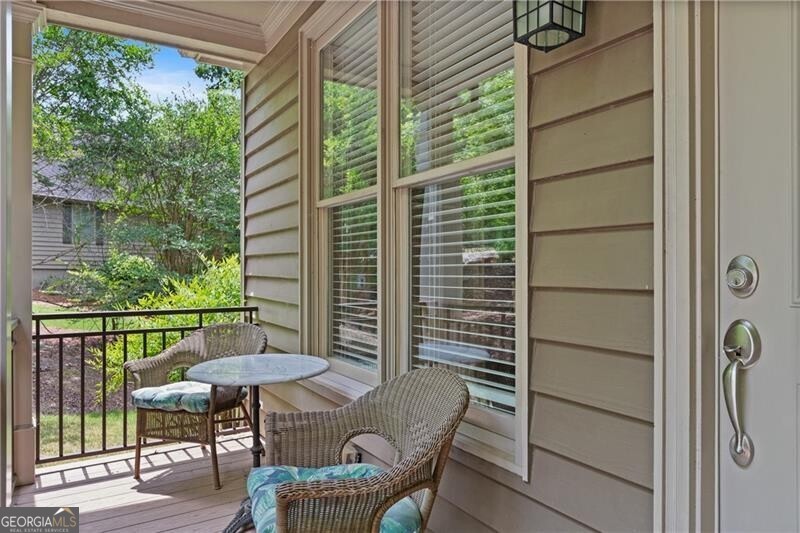 1041 Fox Chase Run Greensboro, GA 30642 - Photo 18 of 45 a view of chair and table in the balcony