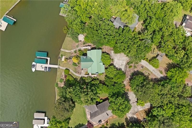 1041 Fox Chase Run Greensboro, GA 30642 - Photo 2 of 45 an aerial view of a house with a yard