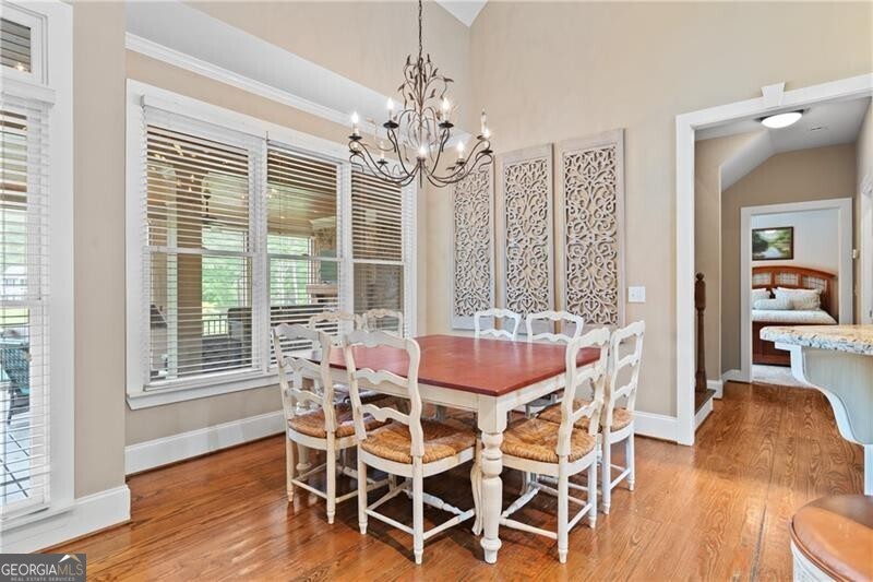 1041 Fox Chase Run Greensboro, GA 30642 - Photo 24 of 45 a view of a dining room with furniture window and wooden floor