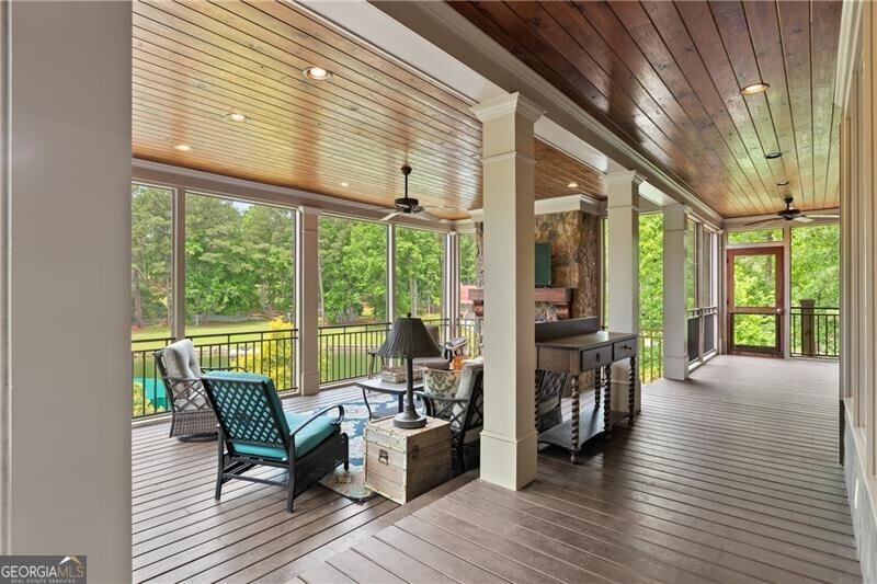 1041 Fox Chase Run Greensboro, GA 30642 - Photo 29 of 45 a view of a porch with wooden floor