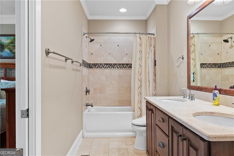 1041 Fox Chase Run Greensboro, GA 30642 - Photo 34 of 45 a bathroom with a granite countertop sink toilet and shower