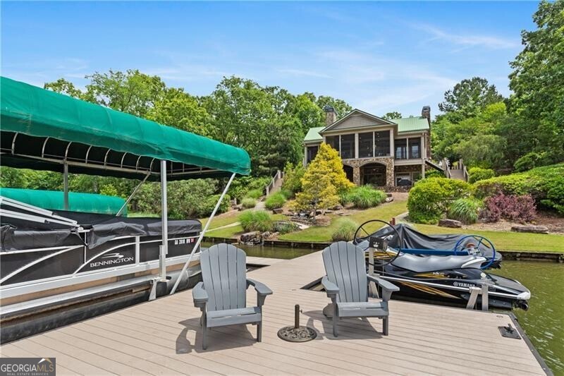 1041 Fox Chase Run Greensboro, GA 30642 - Photo 8 of 45 a view of a backyard with sitting area