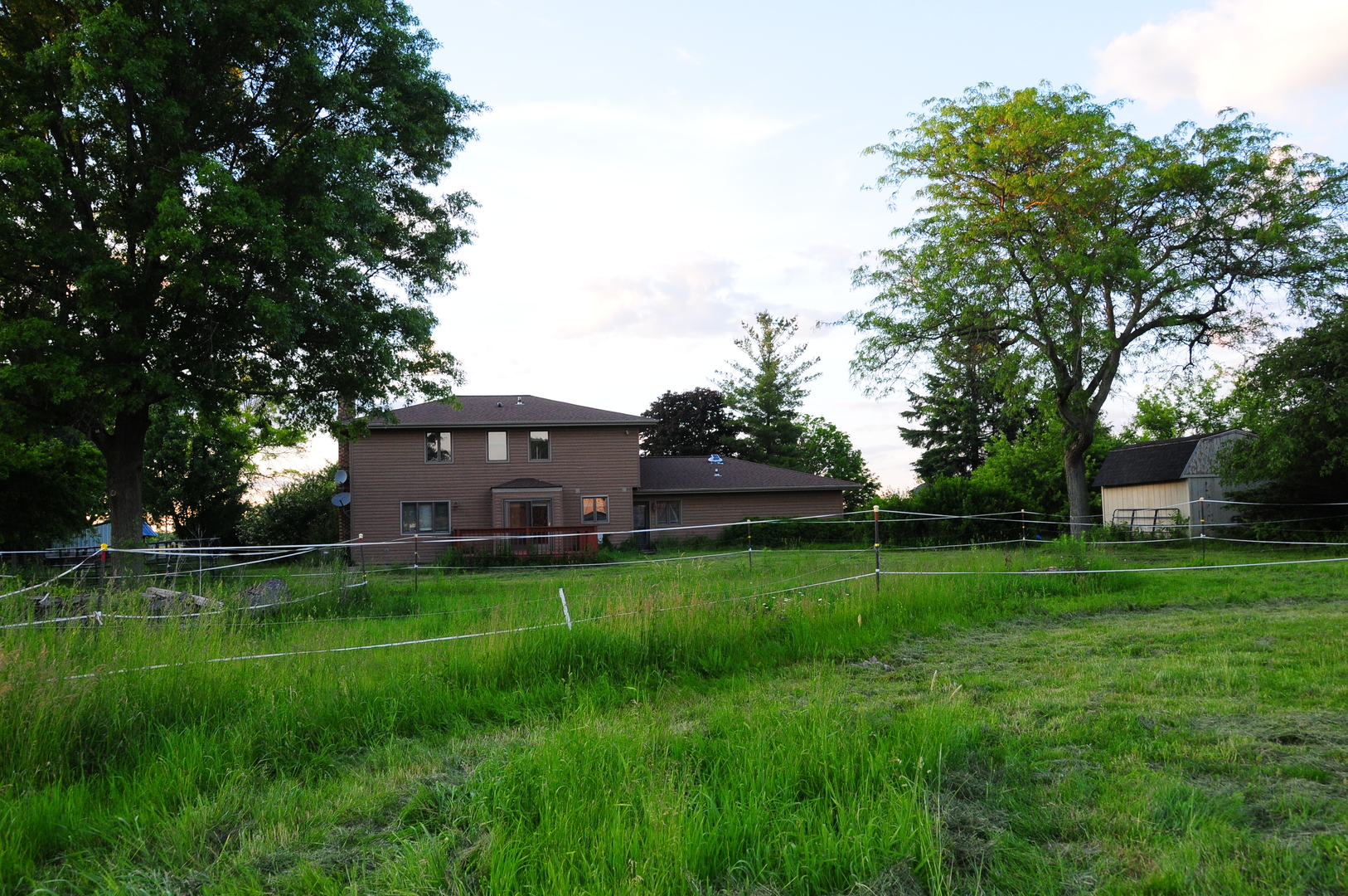 40W883 Plank Road Elgin, IL 60124 - Photo 18 of 47 a backyard of a house with table and chairs