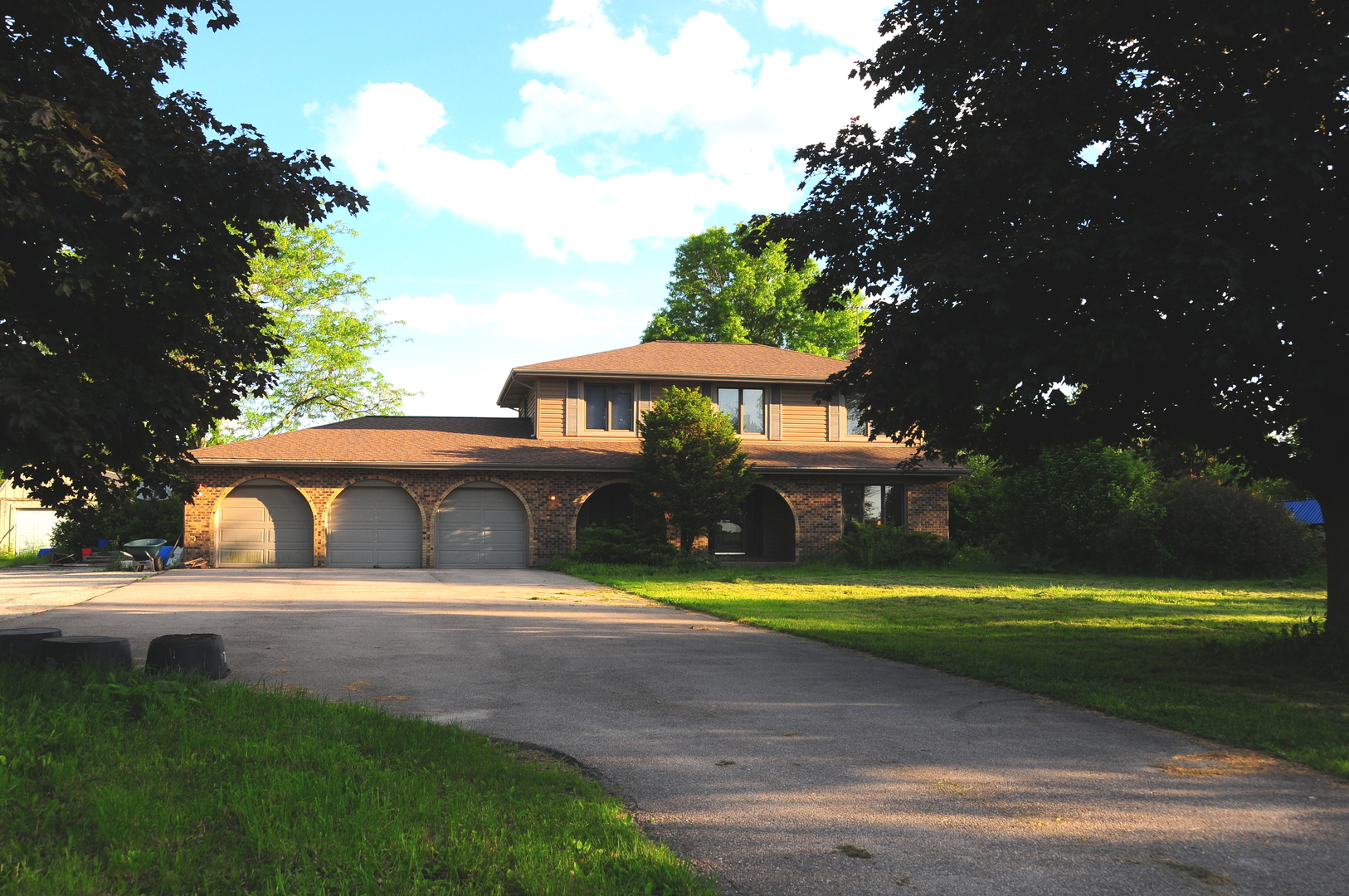 40W883 Plank Road Elgin, IL 60124 - Photo 2 of 47 a view of a swimming pool with an outdoor seating and a yard