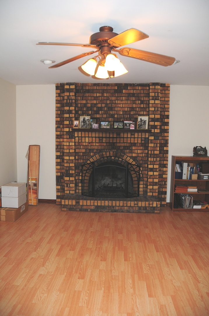 40W883 Plank Road Elgin, IL 60124 - Photo 22 of 47 a view of livingroom with furniture and a fireplace