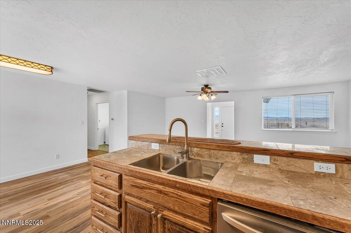 988 Bench Road Fallon, NV 89406 - Photo 13 of 54 a kitchen with a sink and a window