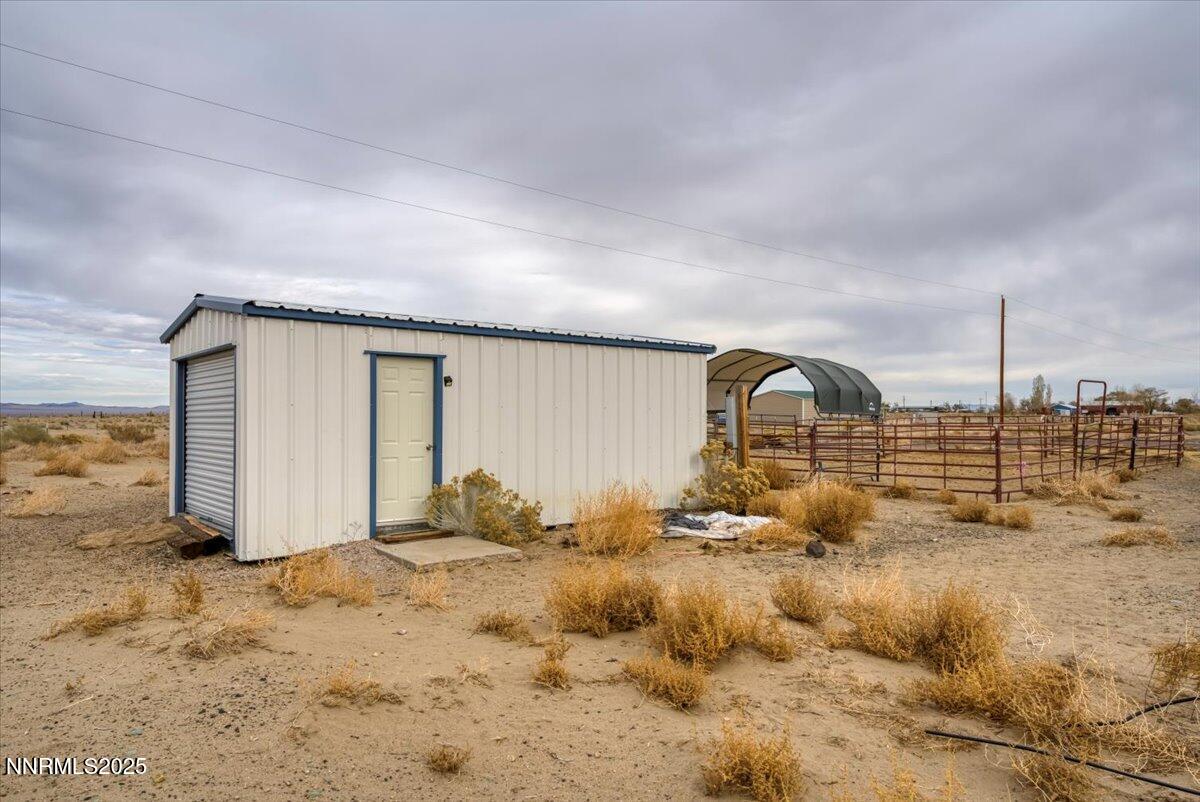 988 Bench Road Fallon, NV 89406 - Photo 34 of 54 a view of a house with a yard