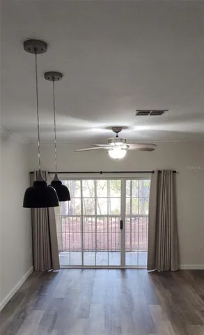 a bathroom with a sink mirror and toilet