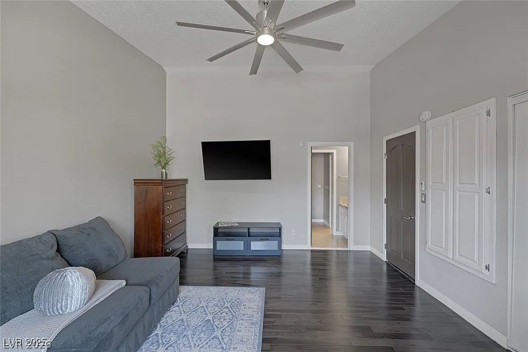 9 Quail Run Road Henderson, NV 89014 - Photo 36 of 57 Hardwood floors and vaulted ceilings elevate this generously proportioned living space.