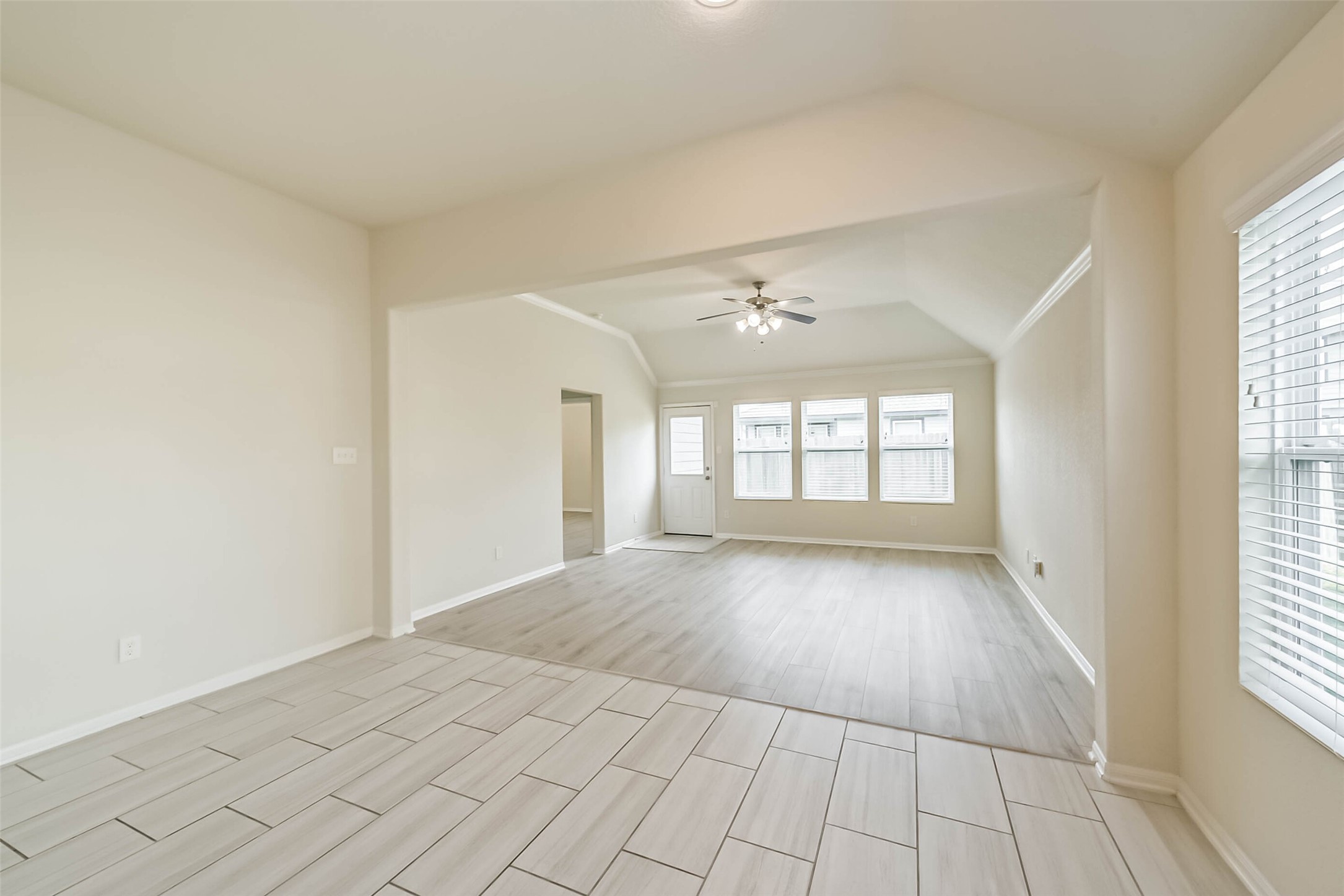 2630 Zephyr Lane Rosenberg, TX 77471 - Photo 17 of 33 wooden floor in an empty room with a window