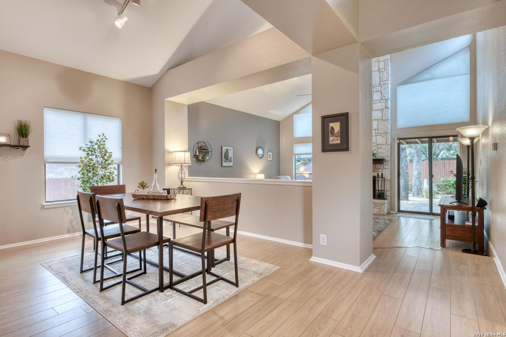3154 Morning Trail San Antonio, TX 78247 - Photo 26 of 41 a view of a dining room with furniture window and wooden floor