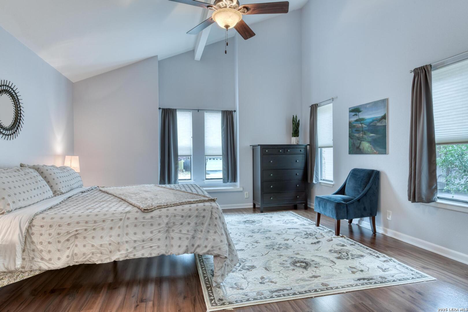 3154 Morning Trail San Antonio, TX 78247 - Photo 30 of 41 a bedroom with a bed windows and a fireplace