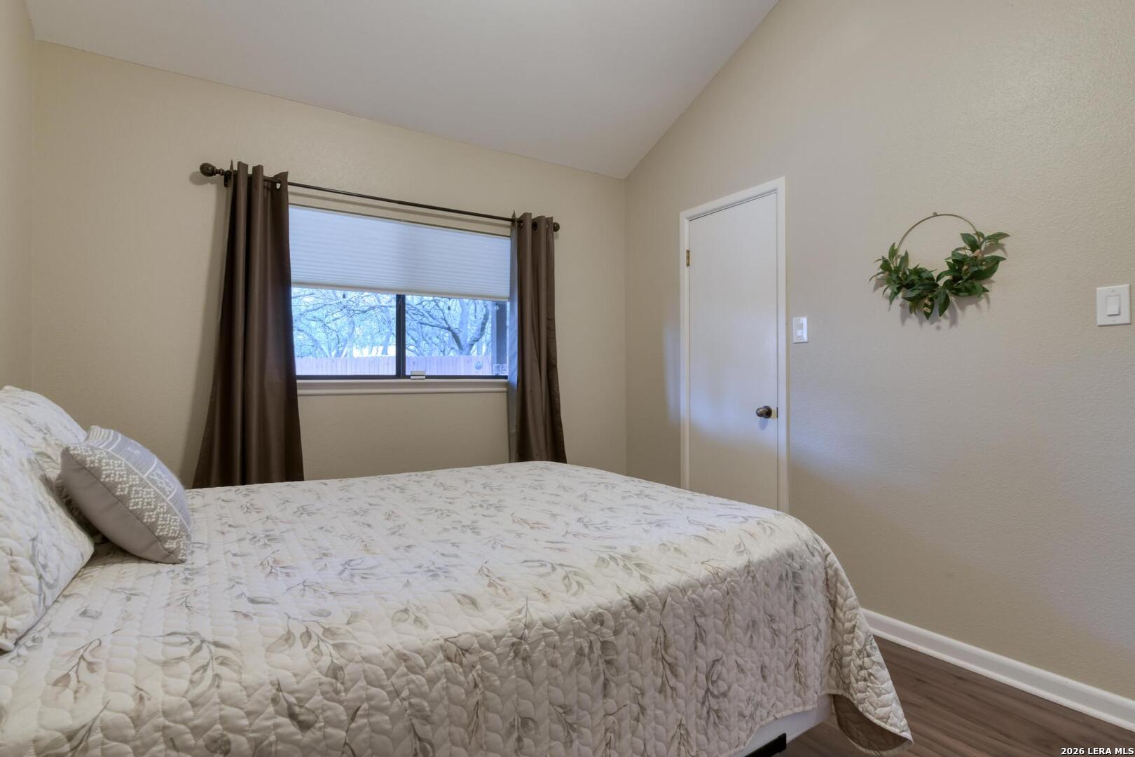 3154 Morning Trail San Antonio, TX 78247 - Photo 34 of 41 a bedroom with a bed and a window