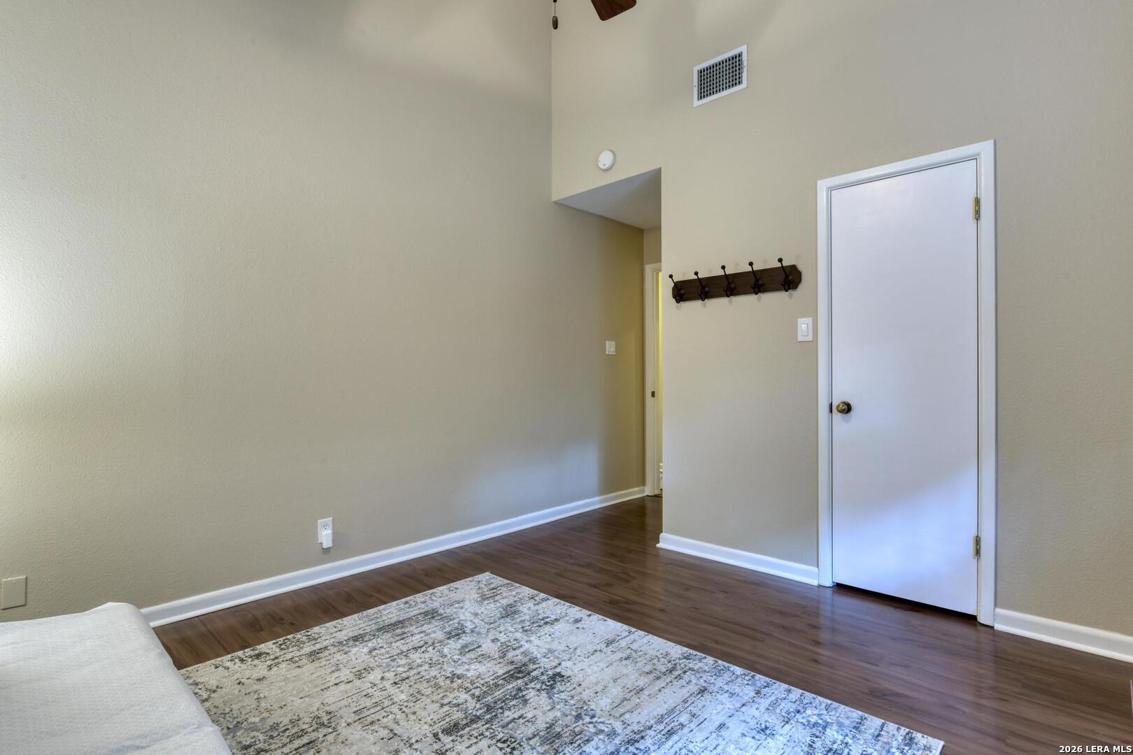 3154 Morning Trail San Antonio, TX 78247 - Photo 35 of 41 an empty room with wooden floor and closet