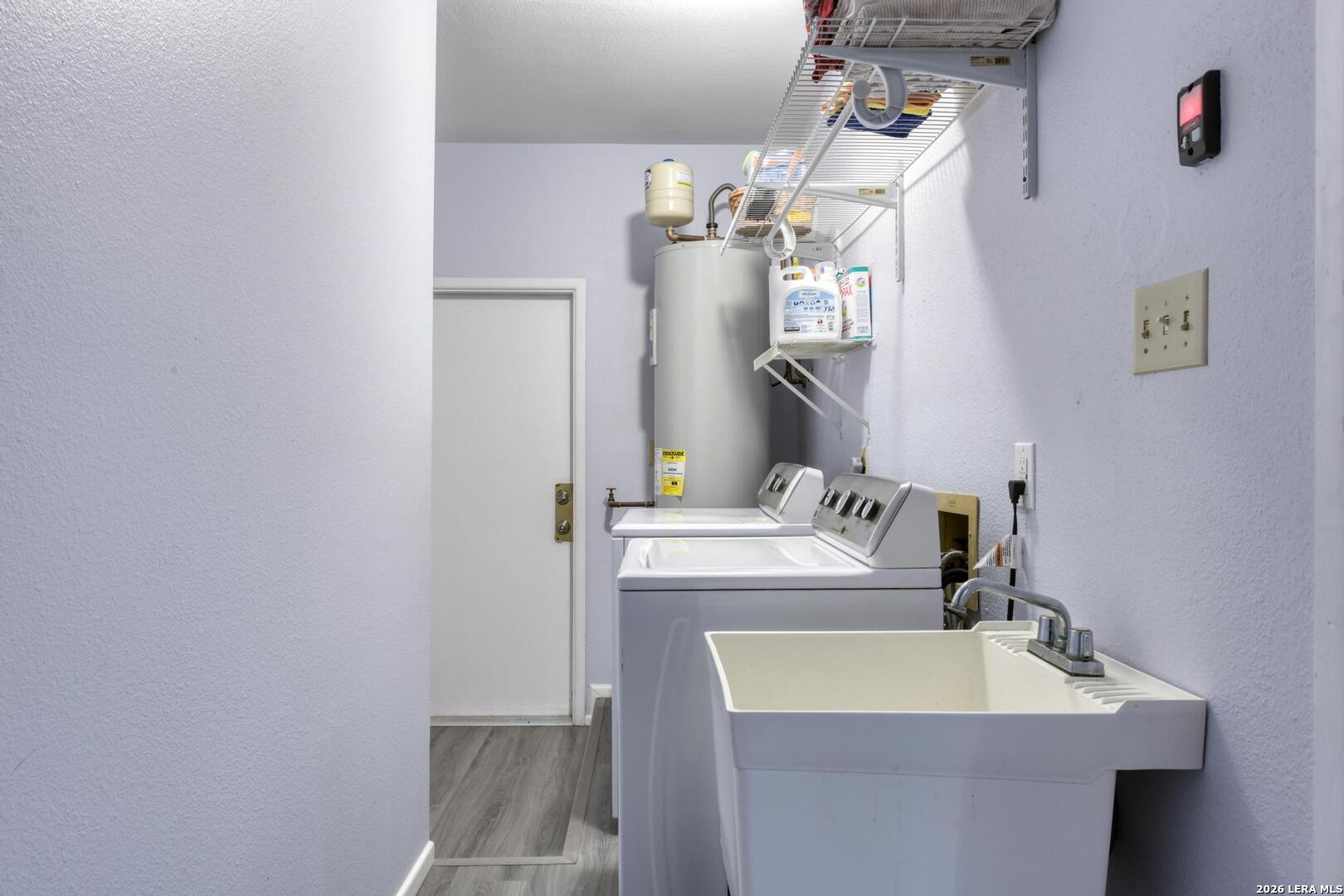 3154 Morning Trail San Antonio, TX 78247 - Photo 36 of 41 a bathroom with a sink and a mirror