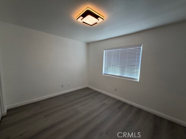 4679 Gorgonio Road Phelan, CA 92371 - Photo 13 of 17 an empty room with a window