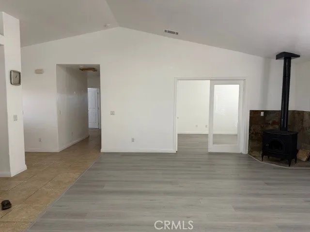 a view of a livingroom with wooden floor