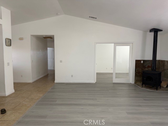 4679 Gorgonio Road Phelan, CA 92371 - Photo 8 of 17 a view of a livingroom with wooden floor