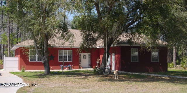 4555 Carter Road St. Augustine, FL 32086 - Photo 1 of 14 a front view of a house