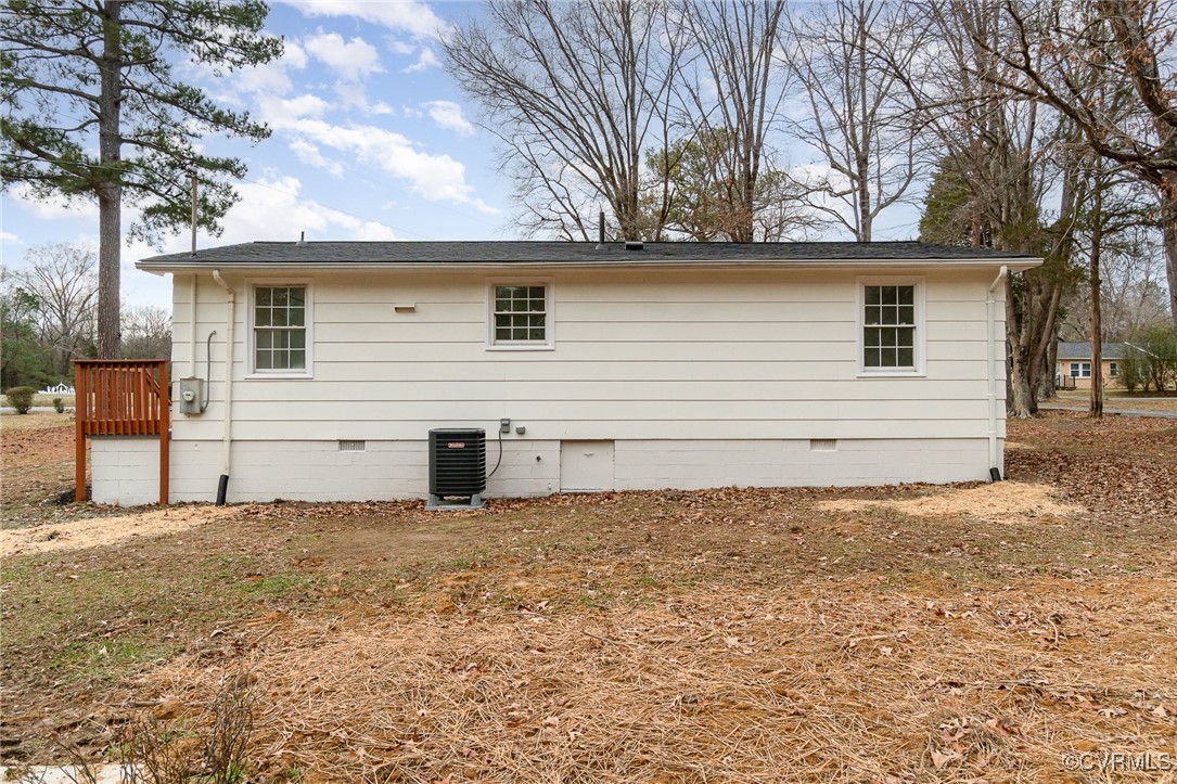 19256 Perimeter Road Milford, VA 22514 - Photo 26 of 29 Back of property featuring cooling unit
