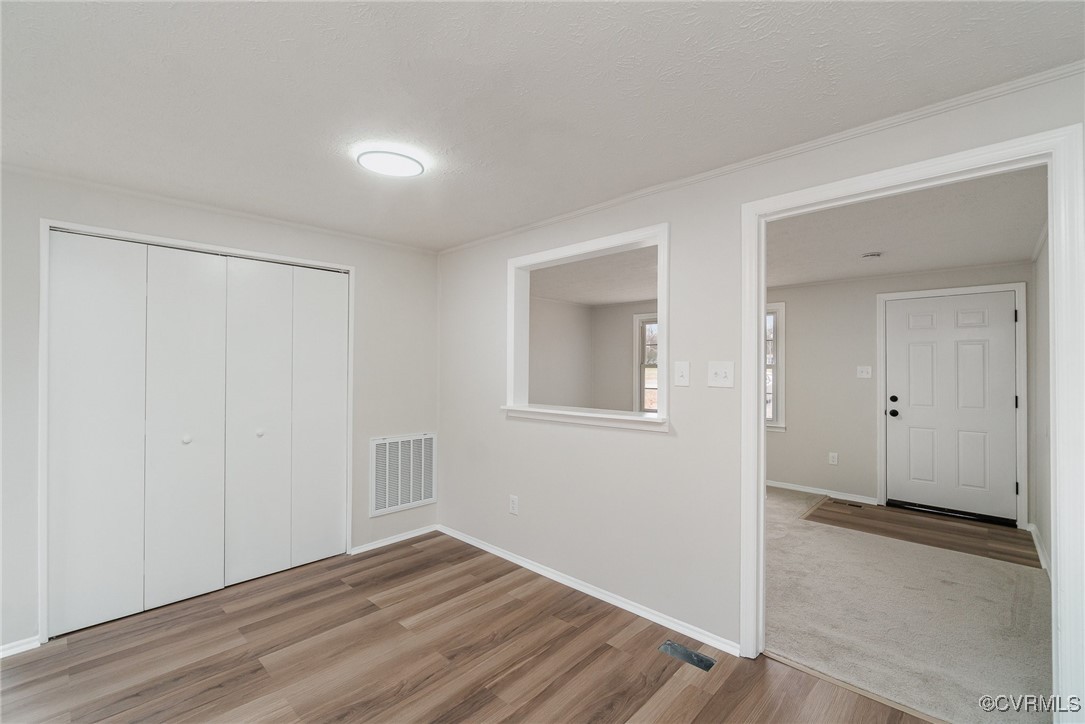 19256 Perimeter Road Milford, VA 22514 - Photo 6 of 29 Unfurnished bedroom featuring light hardwood / woo