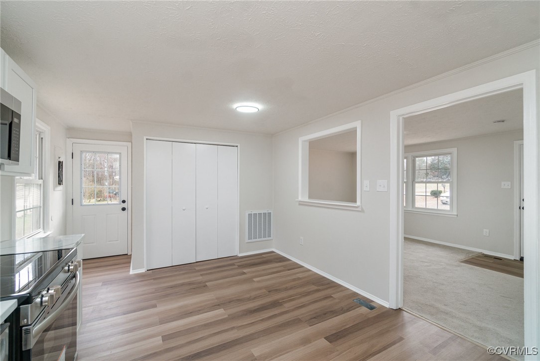 19256 Perimeter Road Milford, VA 22514 - Photo 7 of 29 Unfurnished bedroom with a textured ceiling, light