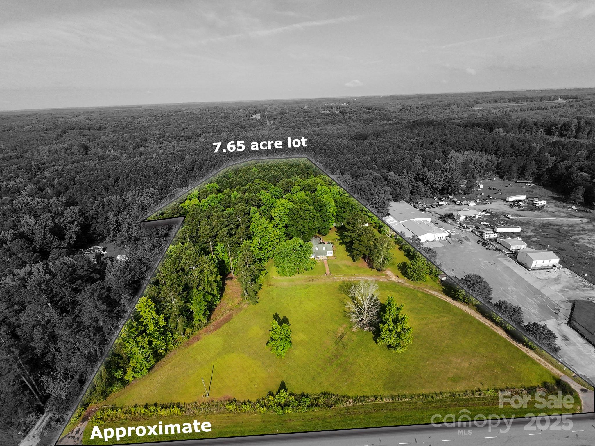 a view of a swimming pool with a outdoor seating and lake view