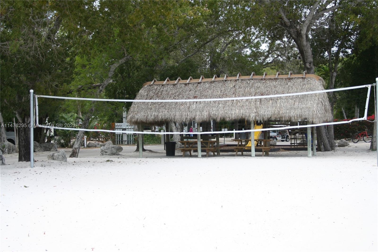 Key Largo Key Largo, FL 33037 - Photo 12 of 18 a view of backyard with green space and barbeque oven