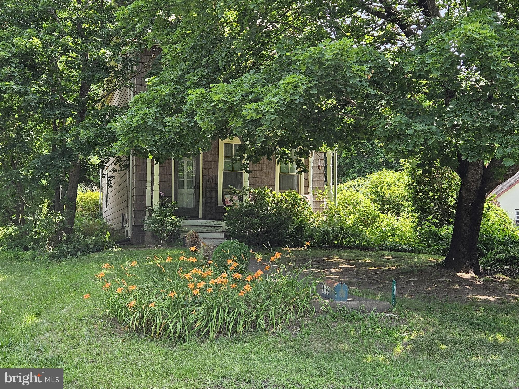 9039 Easton Road Ottsville, PA 18942 - Photo 50 of 61 a view of backyard with a garden and trees