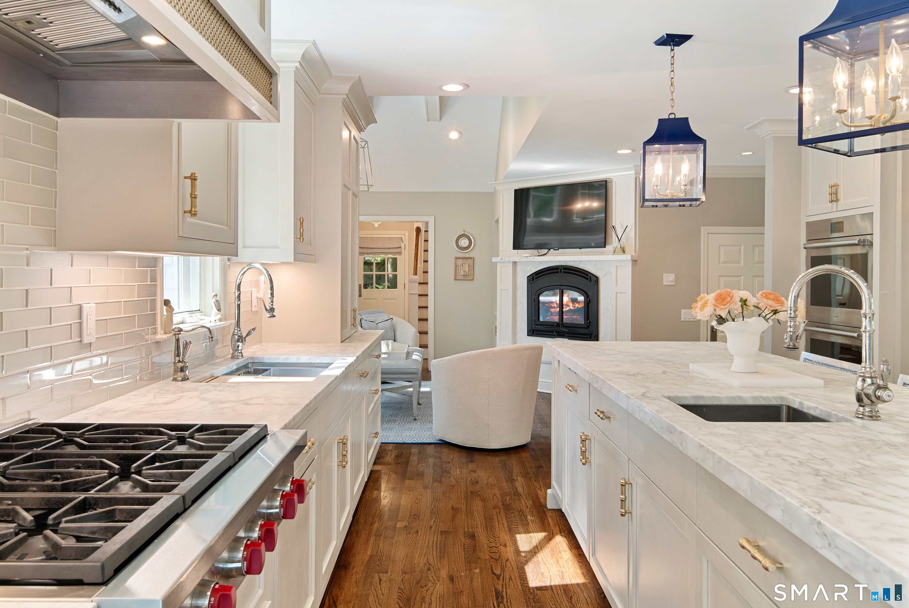 11 McLaren Road South Darien, CT 06820 - Photo 29 of 40 a kitchen with a stove and a sink