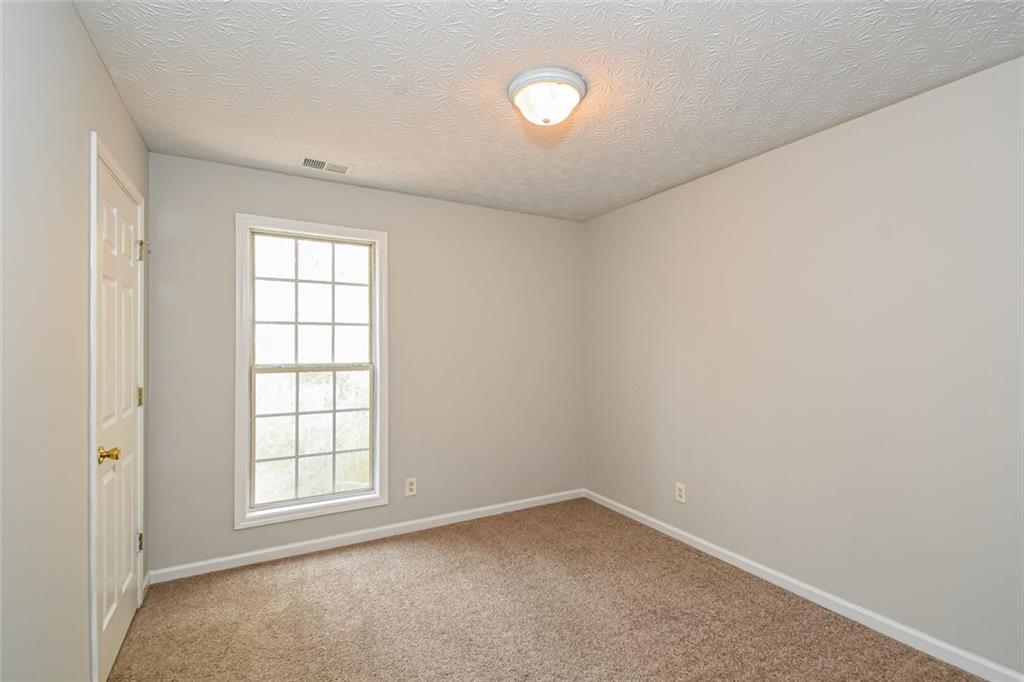 3328 River Run Trail Decatur, GA 30034 - Photo 15 of 20 an empty room with a window