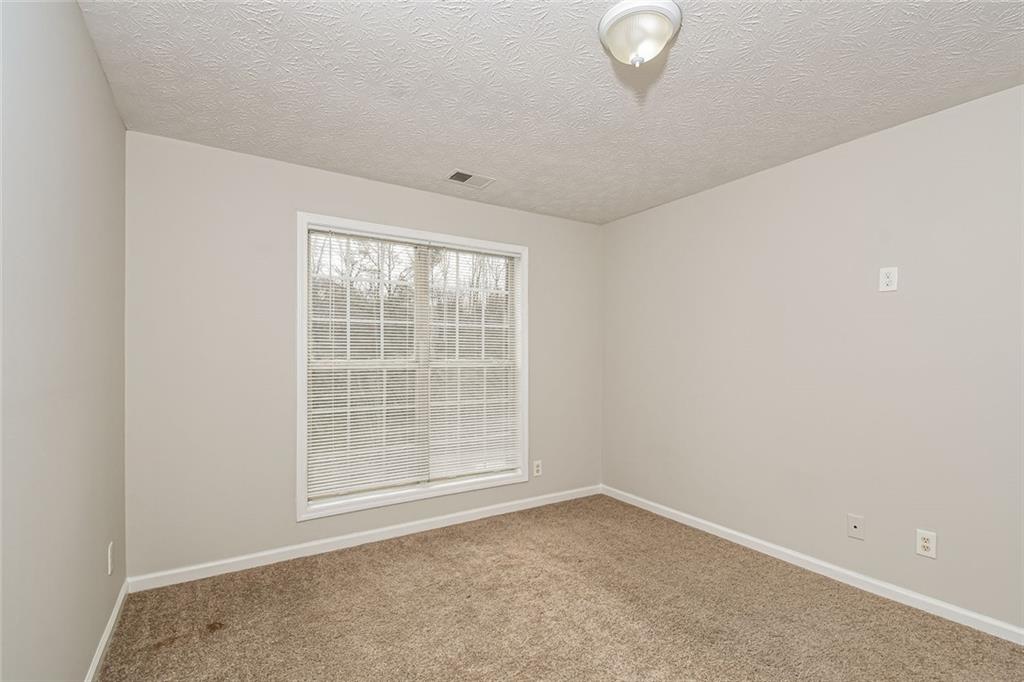 3328 River Run Trail Decatur, GA 30034 - Photo 17 of 20 an empty room with a window