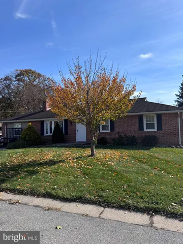 a house view with a garden space