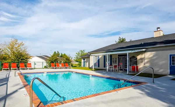 swimming pool view with seating space