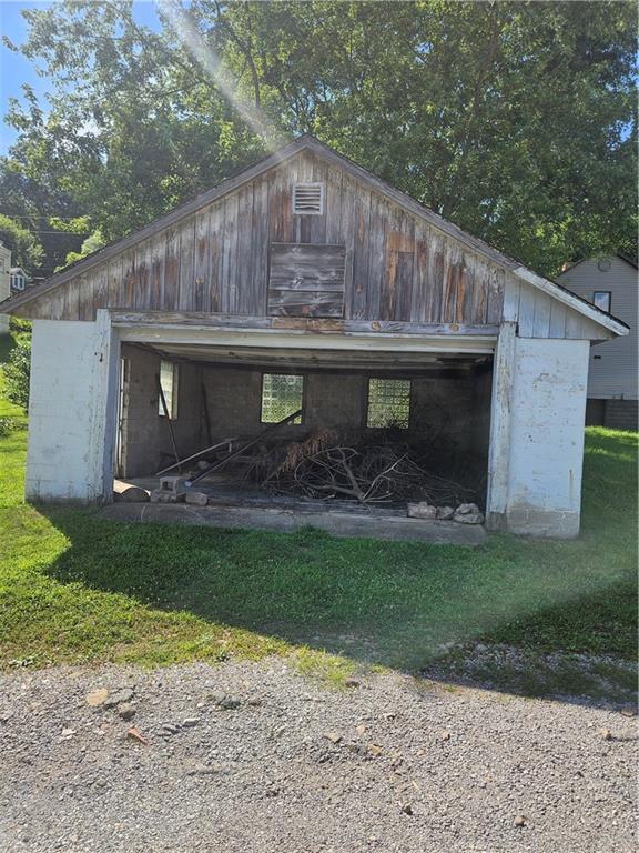 113 Hillside Way New Castle, PA 16101 - Photo 5 of 18 a view of a back yard of the house